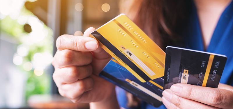 person holding Credit card