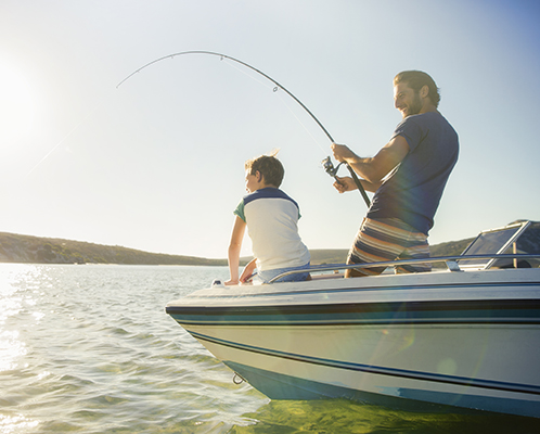 2 people fishing in a boat